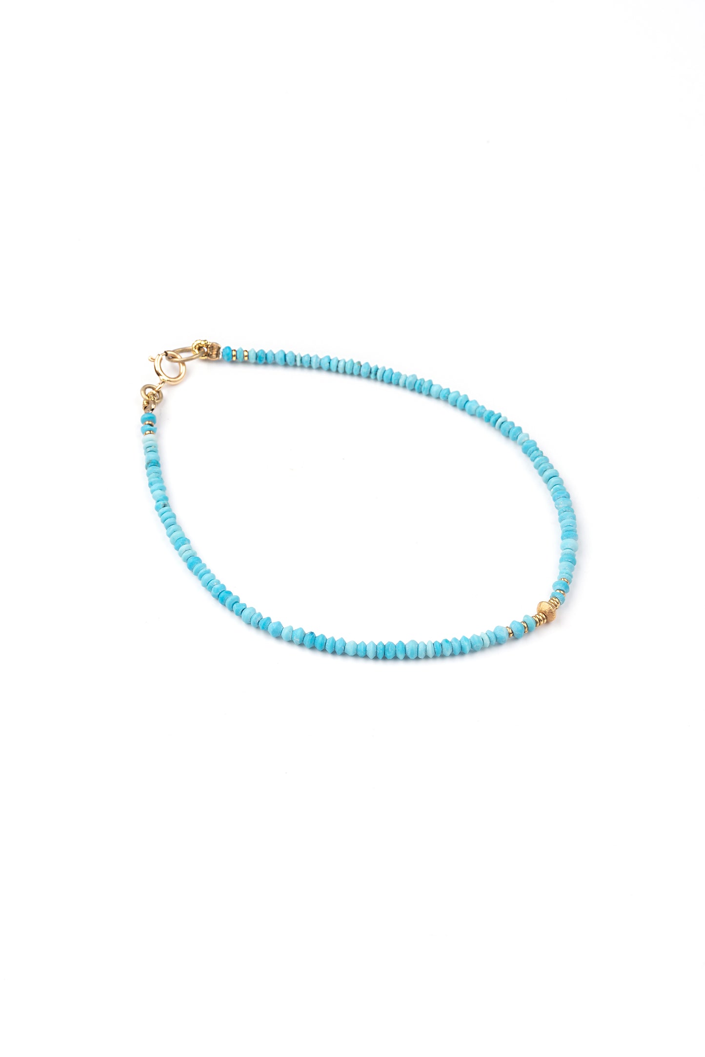 Gold 18K bracelet with turquoise and gold elements in the center