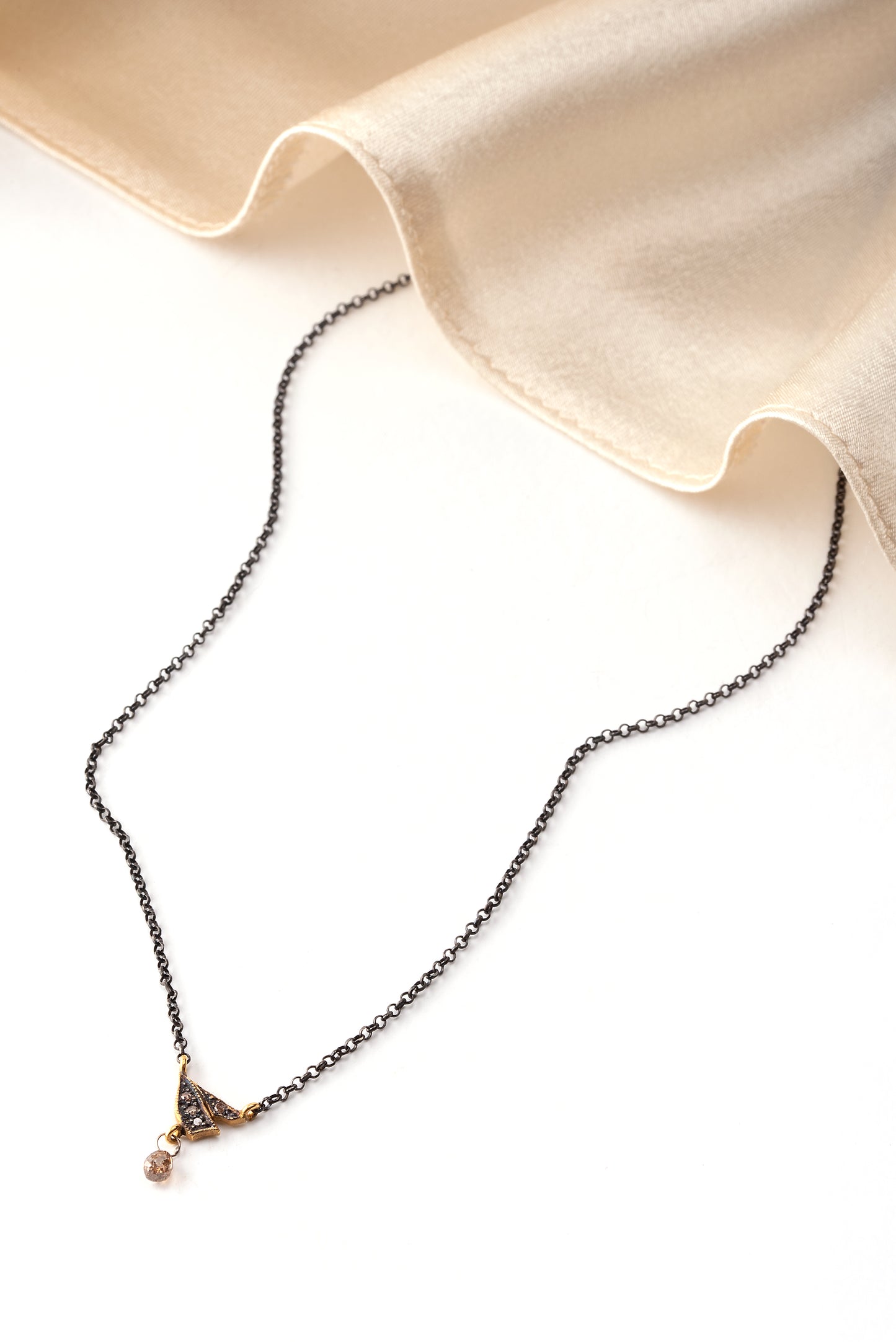 Gold 18K neckless with silver 925 oxidized chain with diamonds